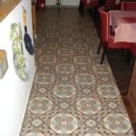 antieke tegelvloer Simons & Cie in restaurant