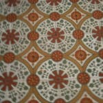 antieke cementtegels met rood